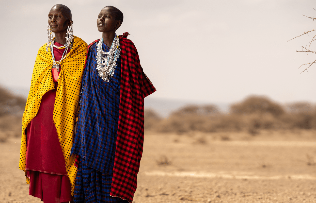 Gallery Slider - People Wearing Checkered Tribal Clothes Sustainable Safaris Africa - Destinations - Kenya - People Wearing Checkered Tribal Clothes