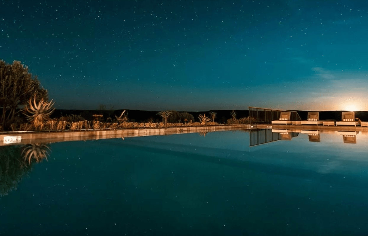 S009-IT2 - Luxury Accommodation  Swimming Pool at Night Sustainable Safaris Africa - Journeys - Luxury Eastern Cape Family Safari - Luxury Accommodation Swimming Pool at Night