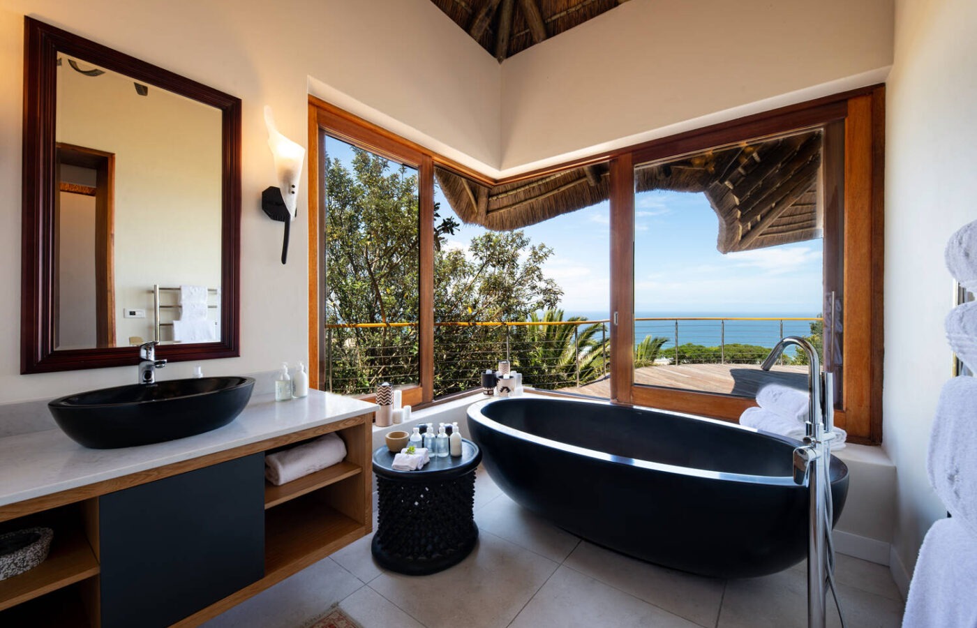 S008 - IT2 - Luxury Bathroom and Window Facing Bathtub Sustainable Safaris Africa - Journeys - Luxury Eastern Cape Couples Safari - Luxury Bathroom and Window Facing Bathtub