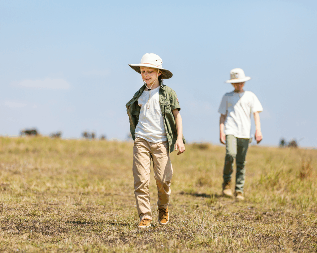 Sustainable Safaris Africa - Experiences - Walking Safaris in Africa Thumbnail - Banner - Two Safari Kids on Walking Safari